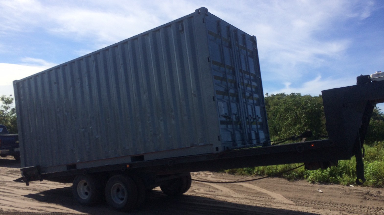 Moving container truck